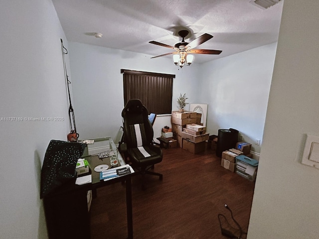 office space featuring dark hardwood / wood-style floors and ceiling fan