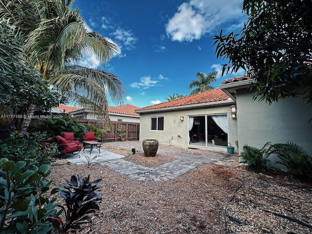 back of house featuring a patio