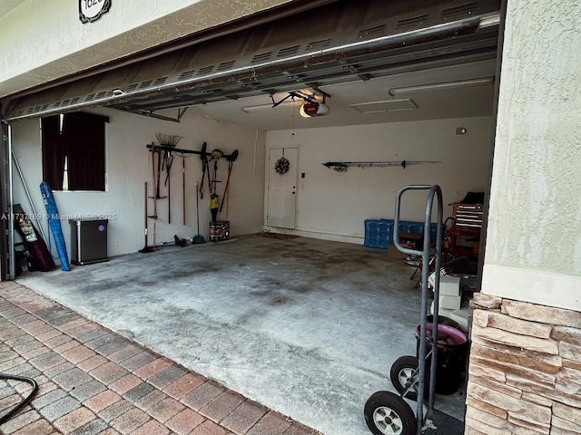 garage featuring a garage door opener