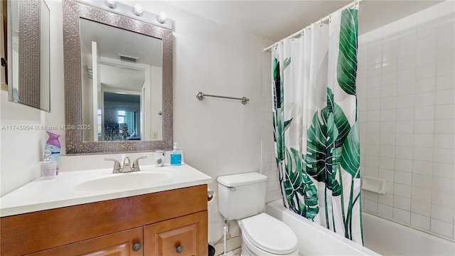 full bathroom with vanity, toilet, and shower / bath combo