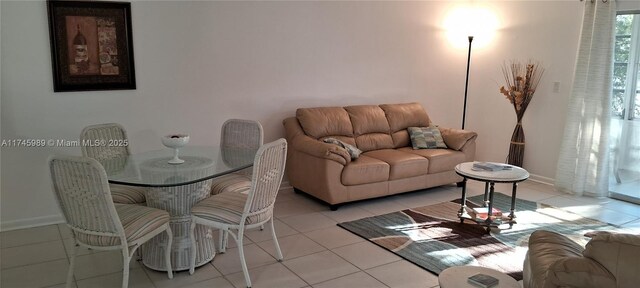 4770 NW 21st St Unit 208, Lauderhill, FL 33313 - living room with light tile patterned floors and baseboards