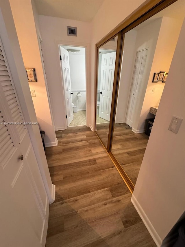 4770 NW 21st St Unit 208, Lauderhill, FL 33313 - corridor featuring wood finished floors and baseboards