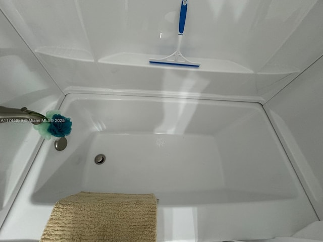 4770 NW 21st St Unit 208, Lauderhill, FL 33313 - bathroom featuring a tub to relax in