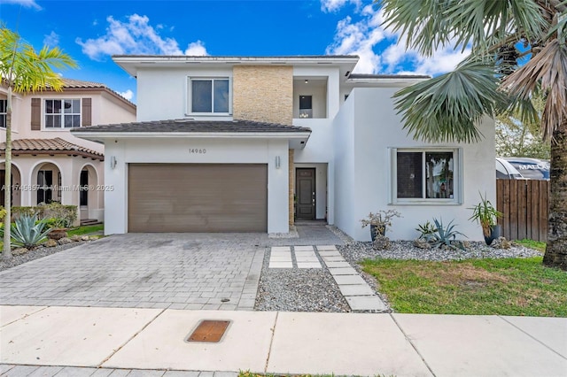 view of front of property with a garage