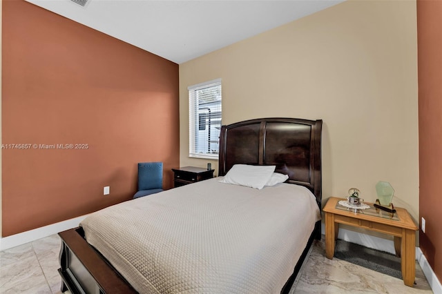 bedroom featuring vaulted ceiling