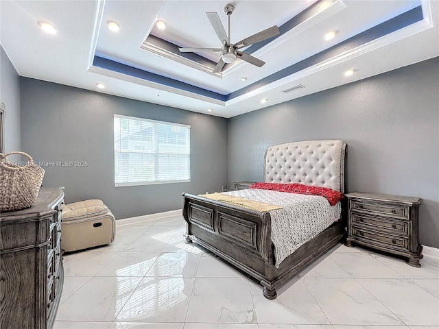 bedroom featuring marble finish floor, a raised ceiling, visible vents, ceiling fan, and baseboards