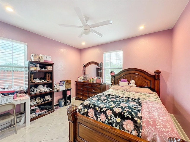 bedroom with a ceiling fan, recessed lighting, baseboards, and light tile patterned floors