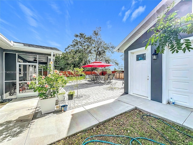 view of patio / terrace featuring outdoor dining area and fence