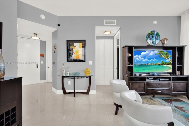 living room featuring light tile patterned floors