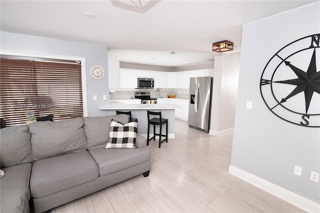 living room featuring light hardwood / wood-style flooring