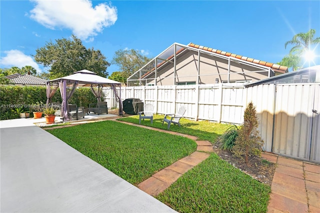 view of yard featuring a gazebo and a patio area