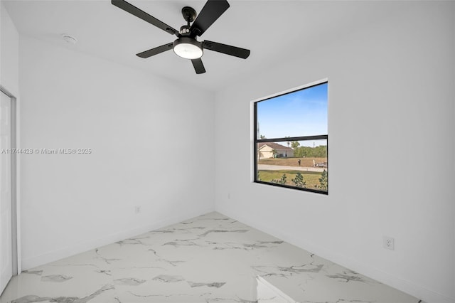 unfurnished room featuring ceiling fan