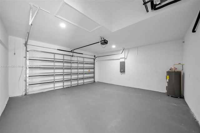 garage featuring a garage door opener, electric water heater, and electric panel