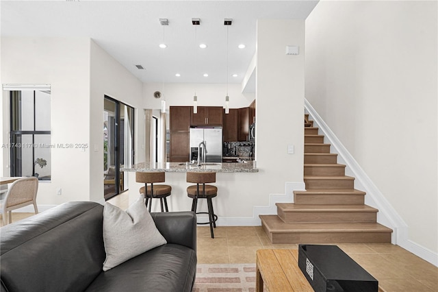 tiled living room with sink