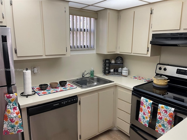 8290 Lake Dr Unit 223, Doral, FL 33166 - kitchen with light countertops, a sink, stainless steel appliances, and under cabinet range hood