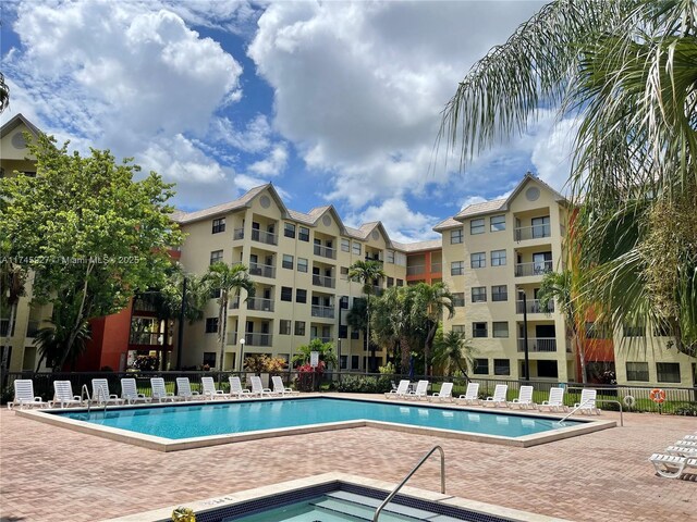 8290 Lake Dr Unit 223, Doral, FL 33166 - community pool featuring fence and a patio area