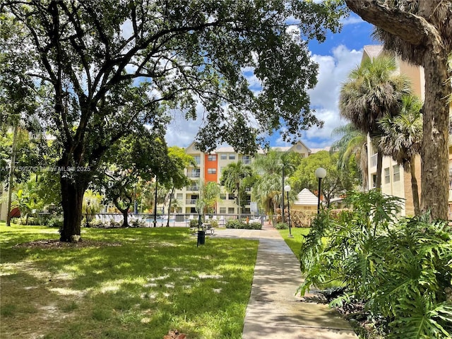 8290 Lake Dr Unit 223, Doral, FL 33166 - view of community featuring a lawn