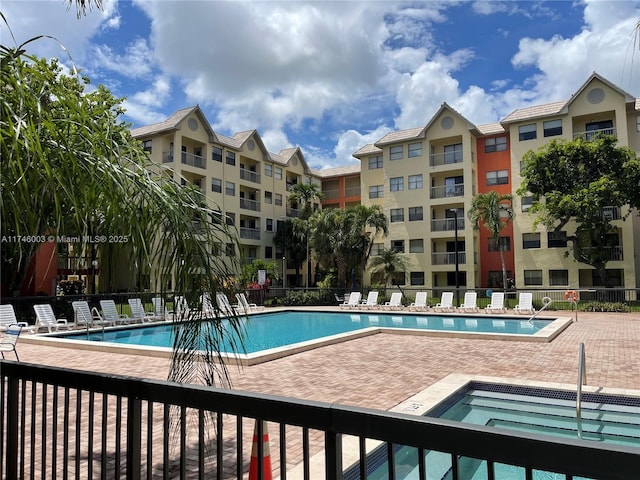 8225 Lake Dr Unit 502, Doral, FL 33166 - pool with fence and a patio area