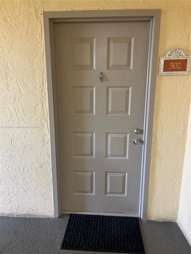 8225 Lake Dr Unit 502, Doral, FL 33166 - doorway to property featuring stucco siding