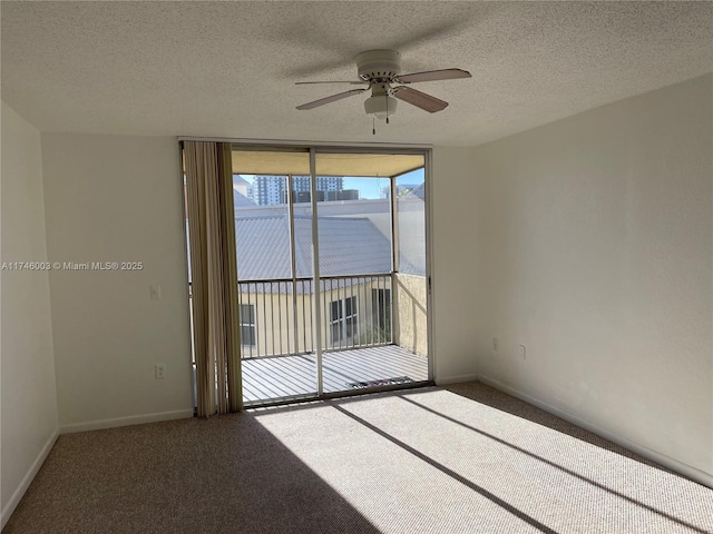 8225 Lake Dr Unit 502, Doral, FL 33166 - carpeted empty room featuring floor to ceiling windows, a textured ceiling, baseboards, and ceiling fan