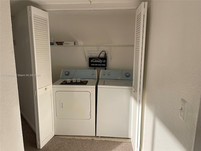 8225 Lake Dr Unit 502, Doral, FL 33166 - clothes washing area with washing machine and clothes dryer and laundry area
