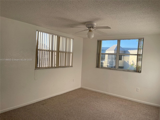 8225 Lake Dr Unit 502, Doral, FL 33166 - unfurnished room featuring a ceiling fan, carpet floors, baseboards, and a textured ceiling