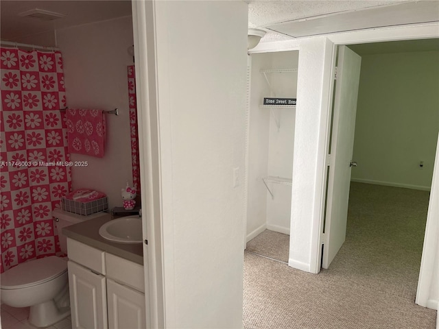 8225 Lake Dr Unit 502, Doral, FL 33166 - bathroom with baseboards, curtained shower, toilet, and vanity