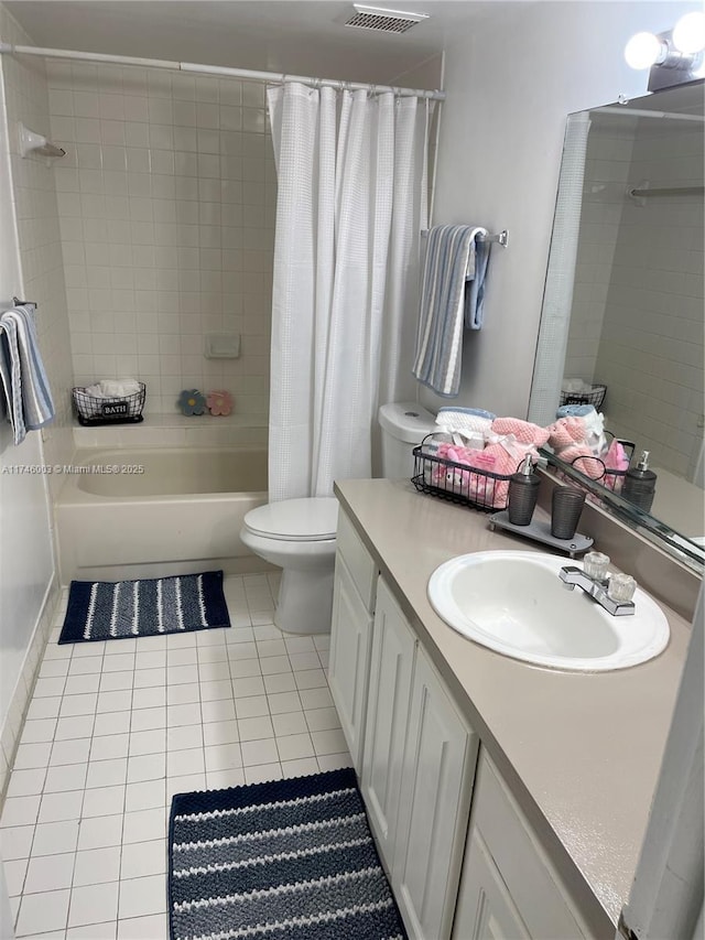 8225 Lake Dr Unit 502, Doral, FL 33166 - bathroom featuring vanity, shower / tub combo, toilet, tile patterned floors, and visible vents