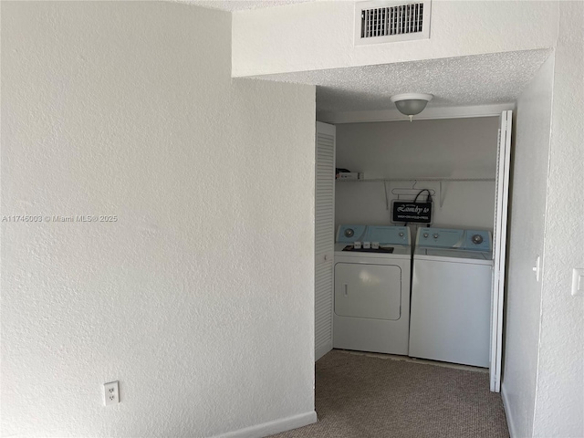 8225 Lake Dr Unit 502, Doral, FL 33166 - laundry area featuring carpet floors, a textured ceiling, laundry area, independent washer and dryer, and visible vents