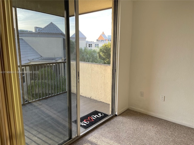 8225 Lake Dr Unit 502, Doral, FL 33166 - doorway to outside featuring carpet flooring and a healthy amount of sunlight