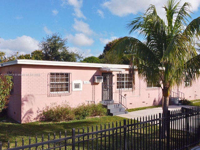 view of front of property with a front lawn