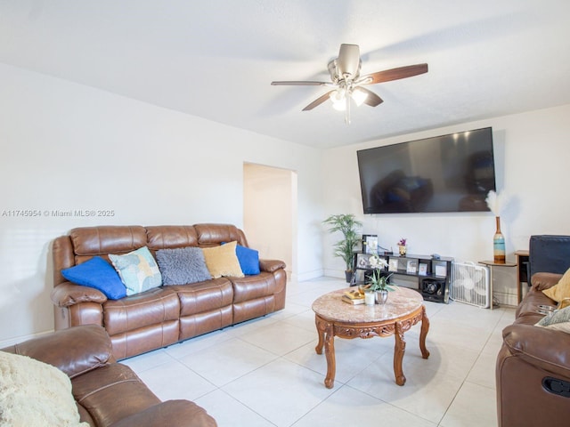 tiled living room featuring ceiling fan