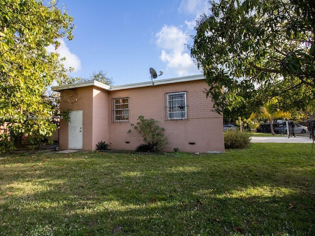 exterior space with a yard