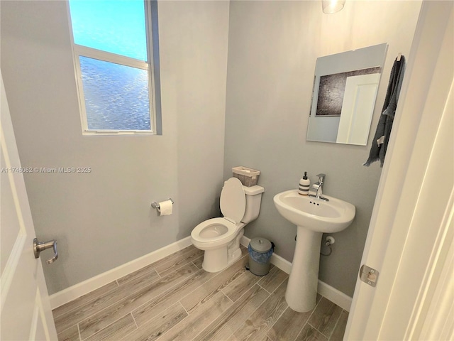 bathroom featuring toilet