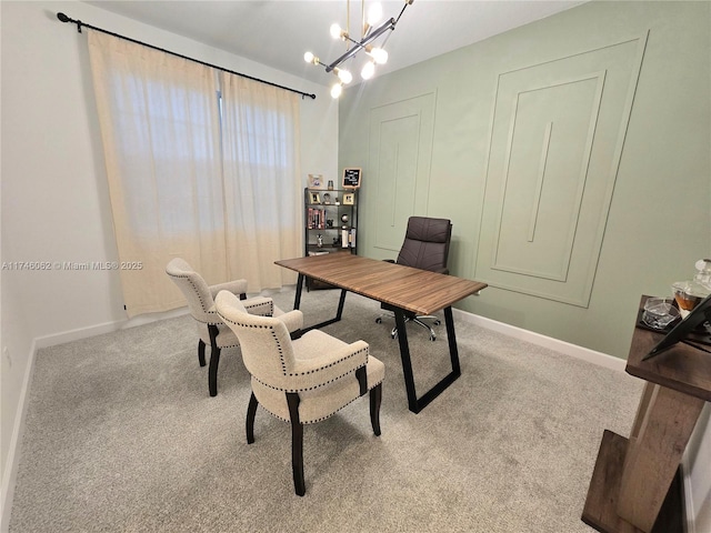 office area with light colored carpet and a chandelier