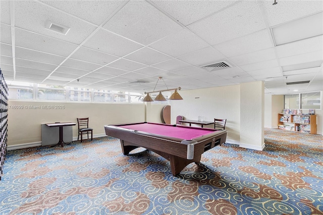 game room with a paneled ceiling, plenty of natural light, and billiards