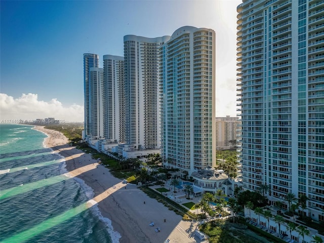 aerial view with a beach view and a water view