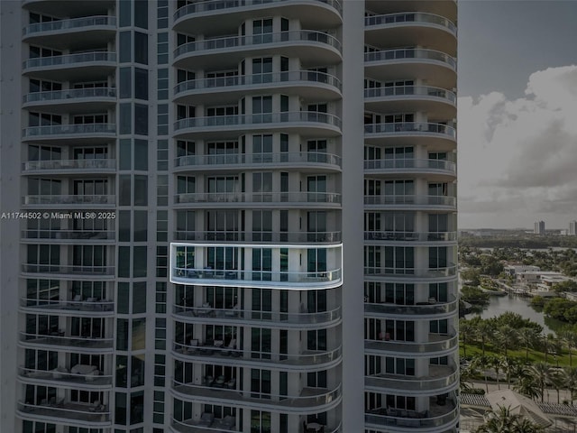 view of building exterior featuring a water view