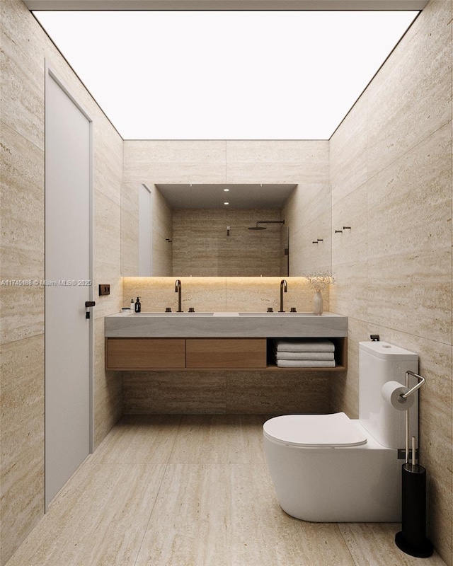 bathroom with vanity, hardwood / wood-style flooring, tile walls, and toilet