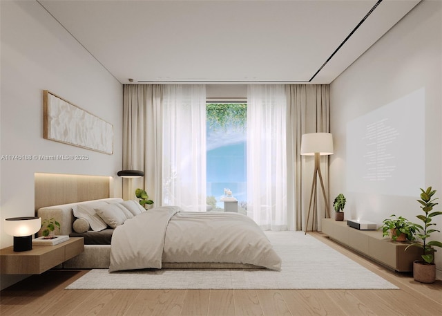 bedroom featuring hardwood / wood-style floors