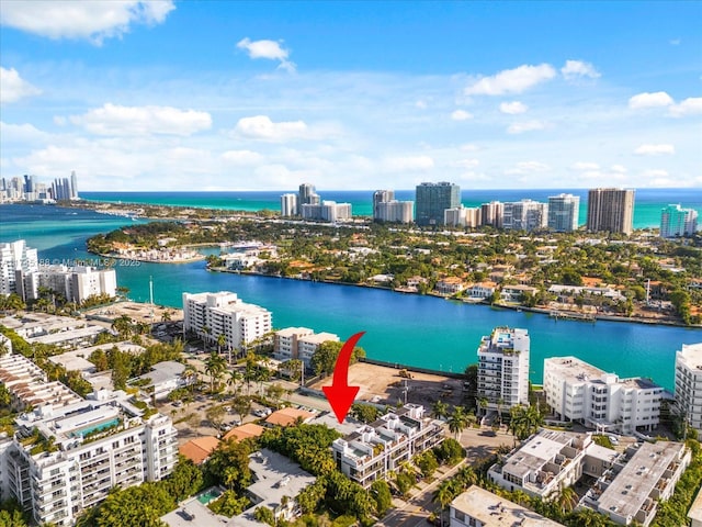 birds eye view of property featuring a water view