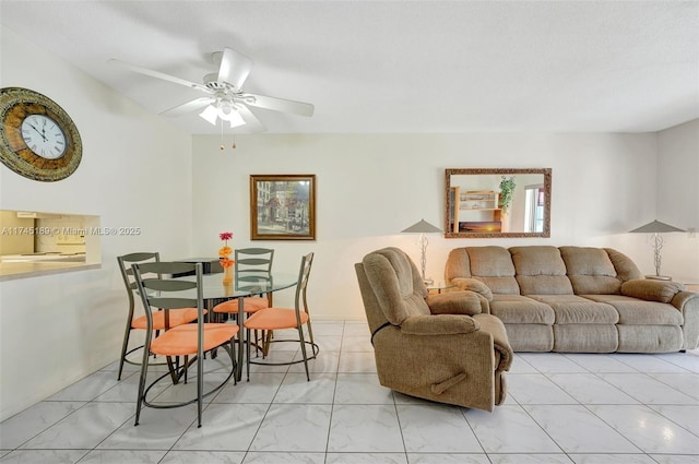 living room with ceiling fan