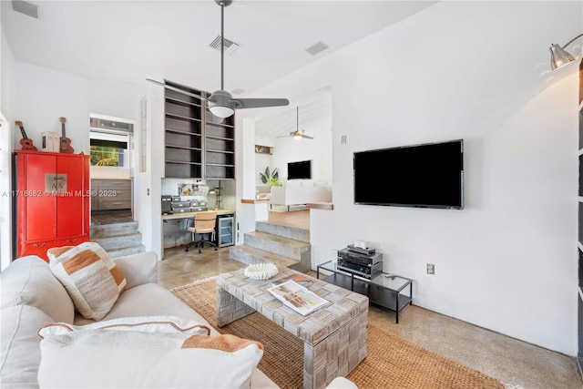 living room with wine cooler and ceiling fan