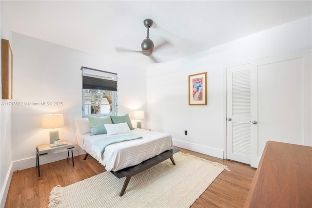 bedroom featuring ceiling fan and light wood-type flooring