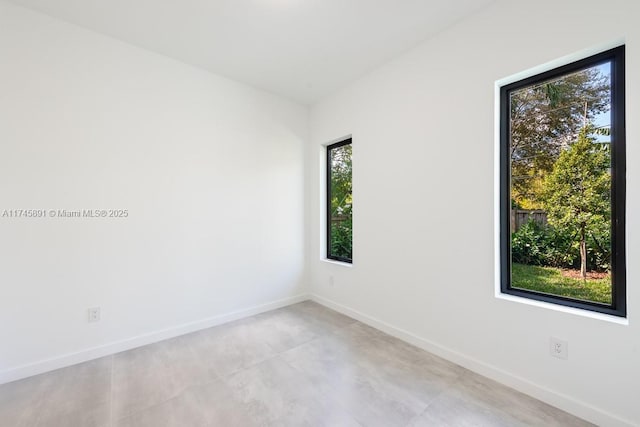 spare room with a wealth of natural light