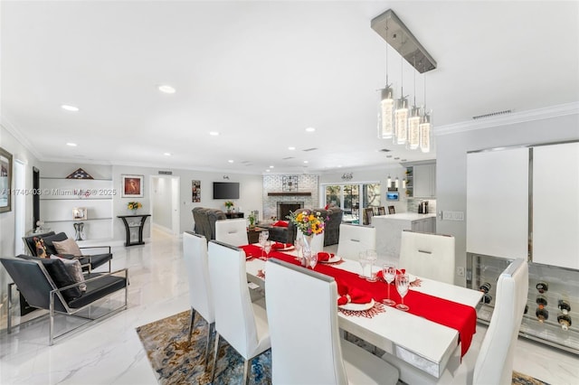 16520 SW 80th Ave, Palmetto Bay, FL 33157 - dining space with crown molding, recessed lighting, and light marble finish flooring