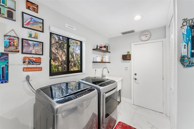 16520 SW 80th Ave, Palmetto Bay, FL 33157 - laundry room featuring washing machine and clothes dryer, light marble finish flooring, and recessed lighting