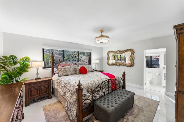 16520 SW 80th Ave, Palmetto Bay, FL 33157 - bedroom with ensuite bathroom and baseboards