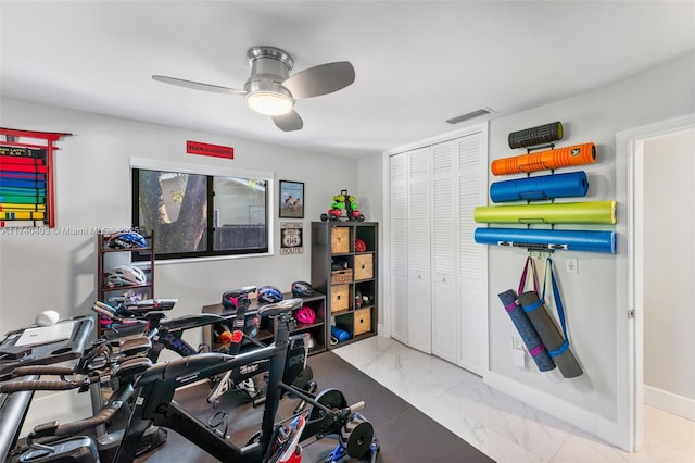 16520 SW 80th Ave, Palmetto Bay, FL 33157 - exercise room featuring a ceiling fan and marble look tile flooring