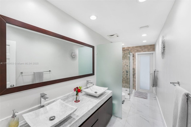 16520 SW 80th Ave, Palmetto Bay, FL 33157 - full bathroom featuring a shower stall, double vanity, marble look tile flooring, and recessed lighting